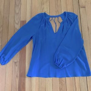 Lilly Pulitzer top. Size Small with a fun open back. Excellent condition!